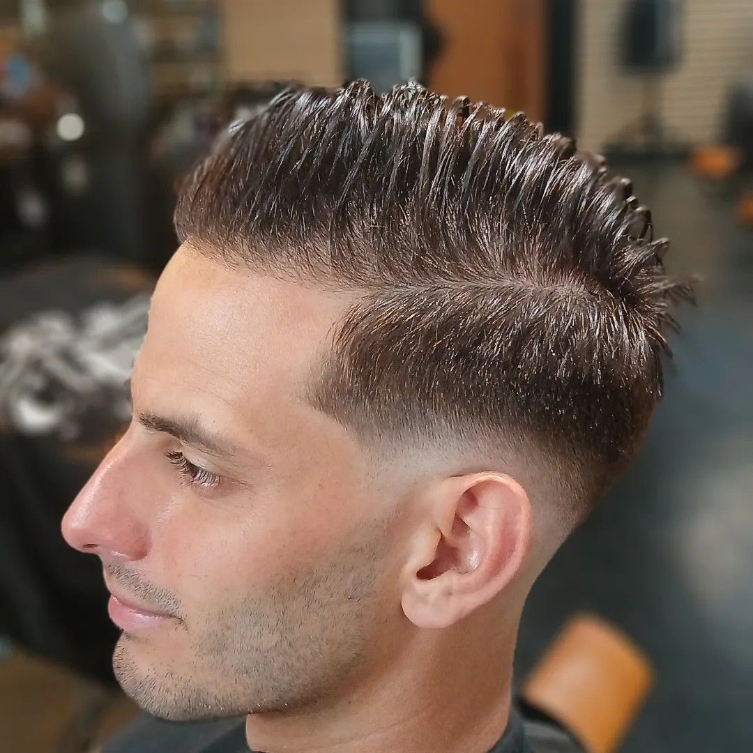Pompadour with high skin fade